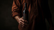 A man holding a bottle of wine in his hands