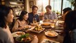 © Banana Images - Big asian family dinner table , eating together,christmas and thanksgiving concept.New year chinese