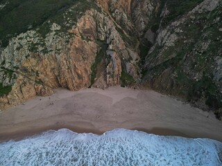 Poster - Aerial view of Amazing Ursa beach near Cabo da Roca in Sintra Cascais (Portugal) during sunset,