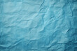 Die Textur von blauem Papier zerknittert - Hintergrund für verschiedene Zwecke