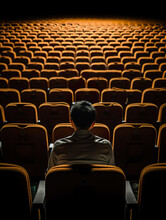Generative AI Illustration Back View Of Anonymous Young Man While Sitting In A Movie Theater Watching A Movie
