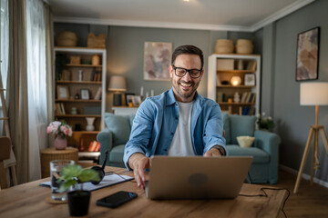 one man adult caucasian work on laptop at home happy smile