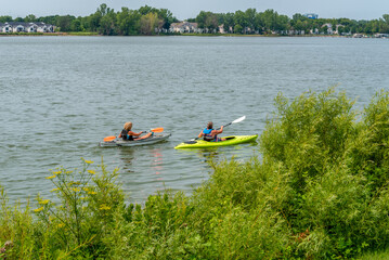 Sticker - Two Women Kayaking On Fox River In Mid July In De Pere, Wisconsin