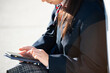 © amanaimages - スマホを見ている制服姿の女子学生