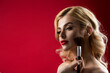 © Yevhen - Make up in process. Applying tone to skin. Beautiful woman face. Hand of visagiste, painting cosmetics beauty model girl