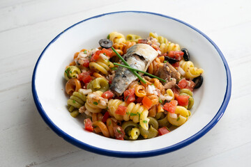 Wall Mural - Fresh pasta with vegetables and sardines.