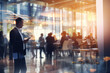 © PRASANNAPIX - Blur picture of businesspeople at office.