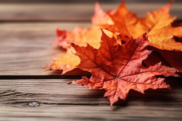 Poster - Autumn maple leaves on wooden table.