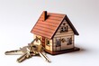 © Papilouz Studio - Miniature real estate house and Keys for sale with isolated white background