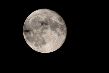 Wall Mural - full moon photographed with a telescope and reflex camera where you can see the craters on the lunar