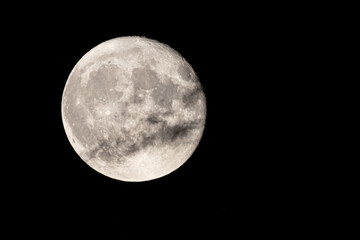 Wall Mural - full moon photographed with a telescope and reflex camera where you can see the craters on the lunar