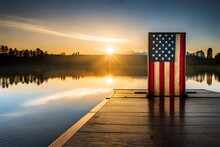 Sunset On The Lake With USA Flag Board .