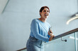 © Jacob Lund - Successful business woman and entrepreneur smiling with joy in an office