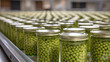 Production of green peas canned in jars at a factory