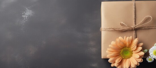 Poster - Ecoconscious gift packed in recyclable paper tied with a unique bow isolated pastel background Copy space