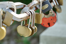 Many Padlocks Closed On Bridge Fence - Love Concept