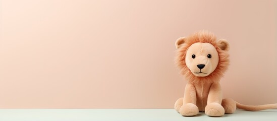 Canvas Print - Cute rubber doll shaped like a lion on isolated pastel background Copy space