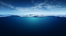Split View Horizon Of Blue Sky With Clouds And Deep Blue Underwater Ocean. Breathtaking Oceanic Panorama - With Copy Space To Insert Ads.