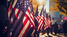 In Mid-morning Sunlight, A Veterans Day Parade With American Flags, And Uniformed Military Veterans Showcases Patriotic Spirit And Unity, Highlighting Their Determination.