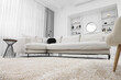 © New Africa - Fluffy carpet and stylish furniture on floor indoors, low angle view