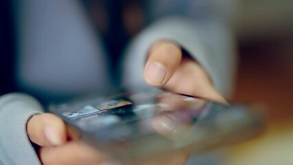Close up of finger touching on screen mobile phone, Hand woman slide device screen smartphone, Browsing and streaming video