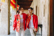 © topntp - Happy young Asian couple in Chinese traditional dresses