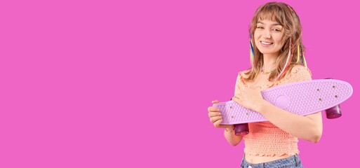 Canvas Print - Happy teenage girl with skateboard on magenta background with space for text