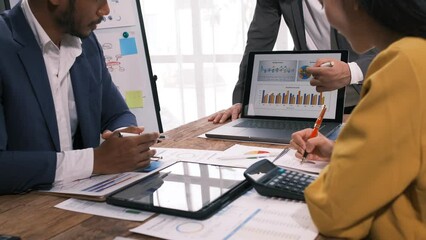 Wall Mural - Businessmen teamwork meeting to discuss the investment, Asian business adviser meeting to analyze and discuss the situation on the financial report in the meeting room.