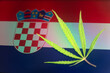hemp leaf on background of the croatian flag. Concept of legalization and changes in legislation regarding cultivation and use of marijuana in the country croatia .