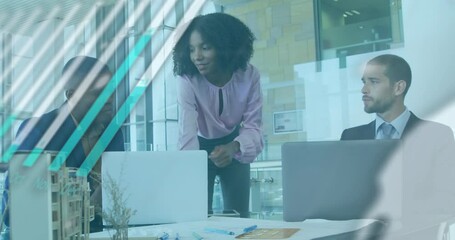 Wall Mural - Animation of graph, globe and computer language over diverse coworkers discussing reports in office