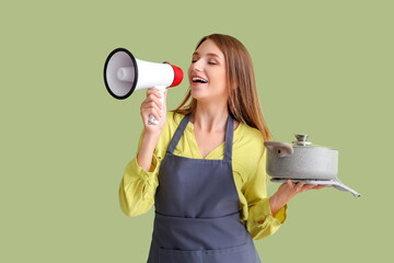 Wall Mural - Young woman with chicken soup shouting into megaphone on green background