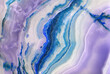 Onyx. Texture of semi-precious stone in blue, purple, white colors. Variety of agate