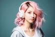 © sergign - Young cute woman with fashionable hairstyle with pink hair of Japanese and Asian appearance listening to music and podcast