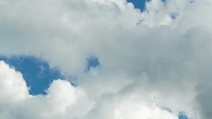 Wall Mural - time lapse of blue sky and white clouds