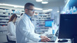 © basketman23 - Pharmacy team collaboratively ensuring efficient operations and customer satisfaction