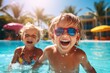 © Karlaage - Two children having fun in a swimming pool with sunglasses created with Generative AI technology