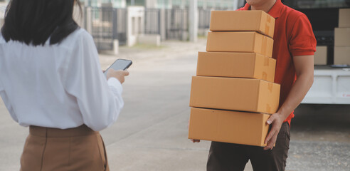 Asian Woman Receiving Product from delivery man at Home, Young Owner Woman Order Product from Smartphone Application, Woman with Online Business or SME Concept.