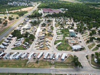 Village of tiny houses. Tiny home community with shared amenities. Usually sized between 100 and 400 square feet, energy-efficient tiny homes allow homeowners to create a secluded backyard destination