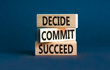 Wall Mural - Decide commit succeed symbol. Concept word Decide Commit Succeed on beautiful wooden block. Beautiful grey table grey background. Business decide commit succeed concept. Copy space.