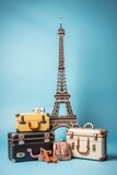 Fototapeta Boho - Suitcases and souvenir Eiffel Tower