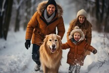 Young Boy Playing And Running With His Dog  In A Snowy Wonderland