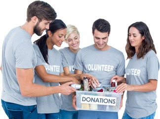 Canvas Print - Digital png photo of diverse group of volunteers with box for donations on transparent background