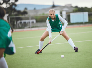 Poster - Field, hockey and woman in sports, game or action in competition with ball, stick and team on artificial grass. Sport, teamwork and women play in training, exercise or workout for goals in match