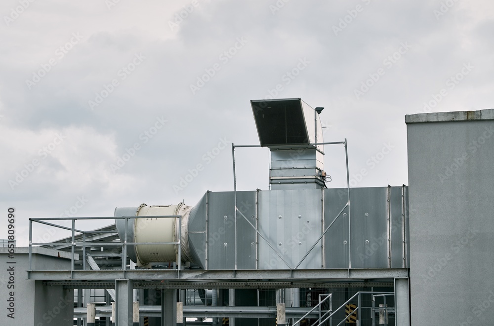 Commercial Pump HVAC. Condenser and compressor on the roof of the building. Big ventilation system. Unit of central air conditioner (AC) or heating ventilation air conditioning system