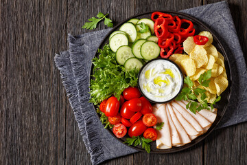 Wall Mural - ham, chips, leafy greens, veggies snack platter