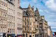 Facades of historic buildings on the busy Royal Mile of the city of Edinburgh, Scotland