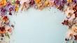 A background using scattered orchids and wildflower seeds on a canvas of pale aqua, highlighted by lavender and sienna. Blank space for text. 