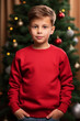 Happy boy kid a red mock-up crew neck sweatshirt , Christmas sweater Mockup with Christmas decorations background