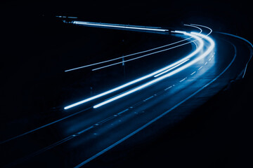 blue car lights at night. long exposure