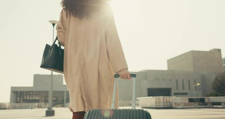 Canvas Print - Woman, back and walking with luggage for business outdoor on ground of rooftop, building or city for trip. Professional, person and feet with suitcase and steps to commute for career journey or work